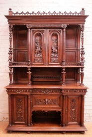 Renaissance style jester cabinet in walnut.