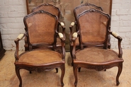 set of 4 Louis XV caned arm chairs in walnut