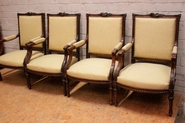 Set of 4 Louis XVI style arm chairs in walnut