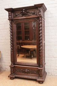 Single door hunt style armoire in oak