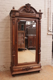 Single door Regency style armoire in walnut