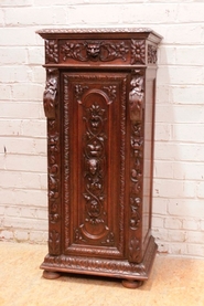 Special narrow hunt style cabinet in oak
