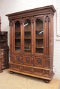 Top quality 3 door renaissance bookcase in walnut