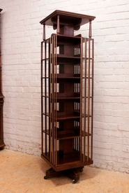Turning bookcase in mahogany signed Terquem Paris