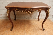 Walnut and gilt Louis XV center table