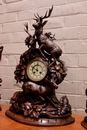 Black forest style Clock set in Walnut, France 19th century