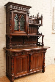 Walnut gothic cabinet with stain glass door