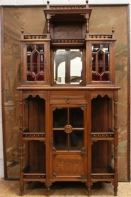 Walnut Henri II display cabinet with beveled glass