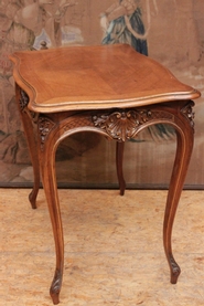 Walnut Louis XV desk table with gilt accents