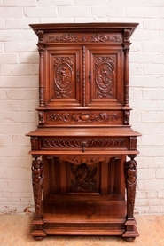 Walnut renaissance cherub cabinet with secret drawer