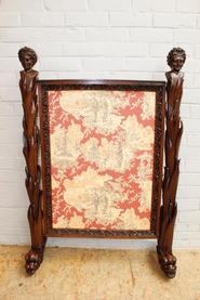 Figural walnut fire screen 19th century