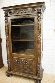 Oak Figural Renaissance display cabinet circa 1920