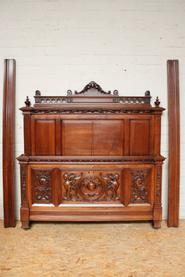 Large walnut Henri II bed 19th century