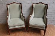 Pair walnut Louis XVI bergeres 19th century