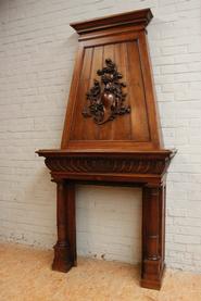 Walnut Henri II fire mantle, 19th century