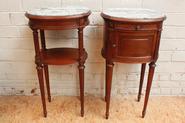 two mahogany Louis XVI end tables 19th century