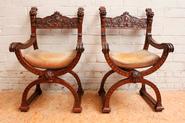 Pair walnut arm chairs.