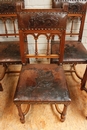 8 walnut Henri II chairs print leather, France 19th century