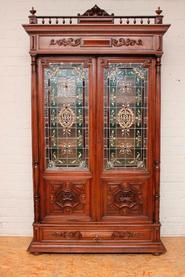 Walnut Henri II bookcase with stain glass 19th century