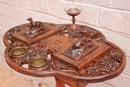 Black forest style Smoker table in Walnut, France 19th century