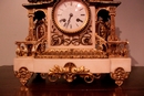 style Clock in bronze and marble, France 19th century