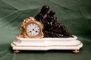 style Clock in Bronze and marble, France 19th century