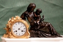 style Clock in Bronze and marble, France 19th century