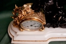 style Clock in Bronze and marble, France 19th century