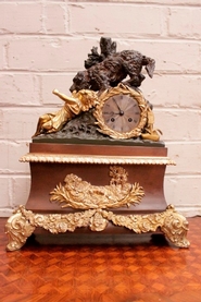 Bronze clock dog saving girl