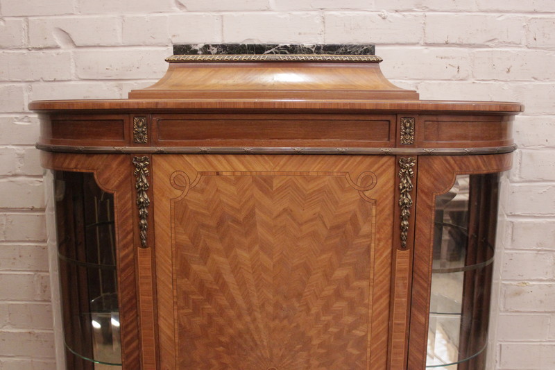 Display cabinet with bronze