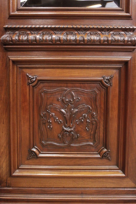 Exceptional monumental regency bookcase in walnut