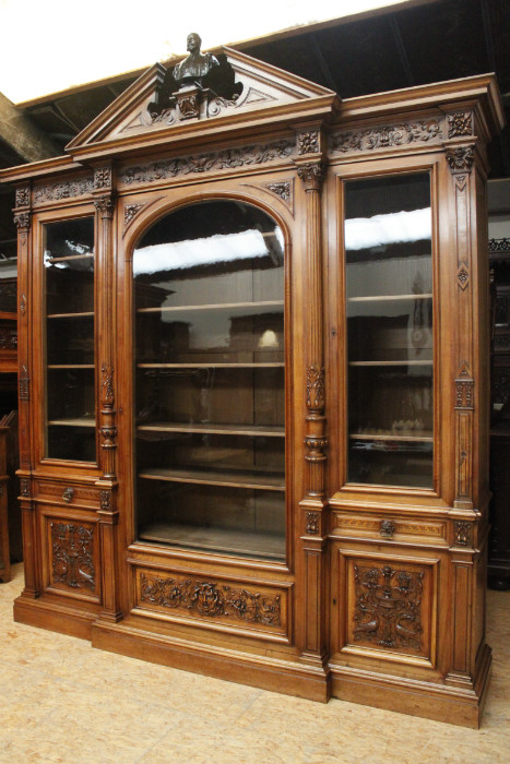 Exceptional monumental walnut renaissance bookcase with bronze statue of Doctor Pinard