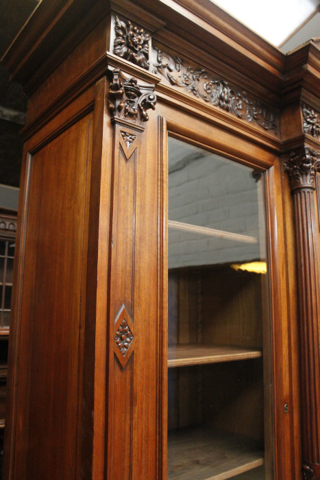 Exceptional monumental walnut renaissance bookcase with bronze statue of Doctor Pinard