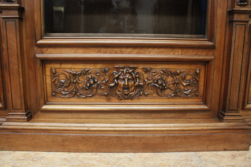 Exceptional monumental walnut renaissance bookcase with bronze statue of Doctor Pinard