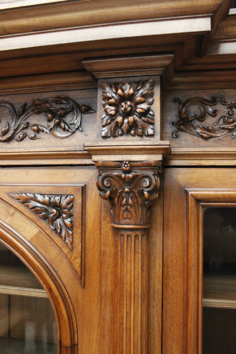 Exceptional monumental walnut renaissance bookcase with bronze statue of Doctor Pinard