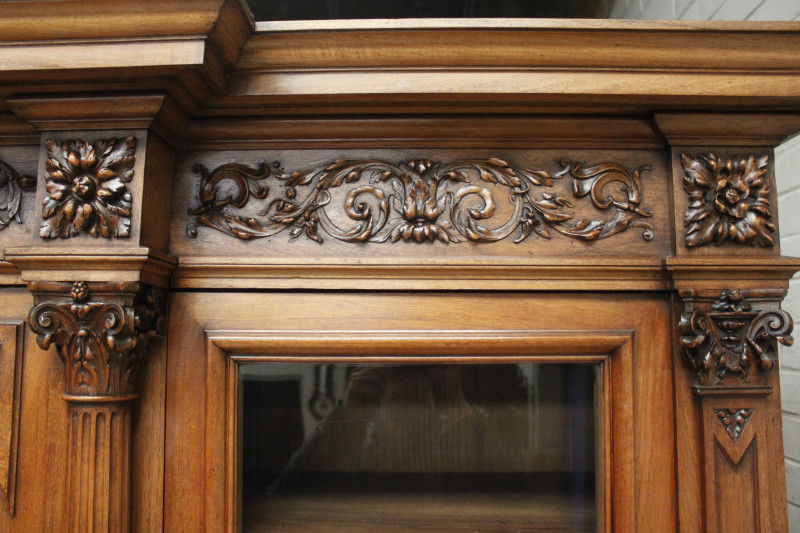 Exceptional monumental walnut renaissance bookcase with bronze statue of Doctor Pinard