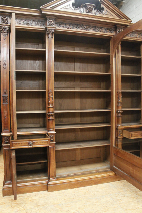 Exceptional monumental walnut renaissance bookcase with bronze statue of Doctor Pinard