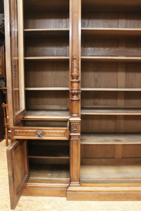 Exceptional monumental walnut renaissance bookcase with bronze statue of Doctor Pinard