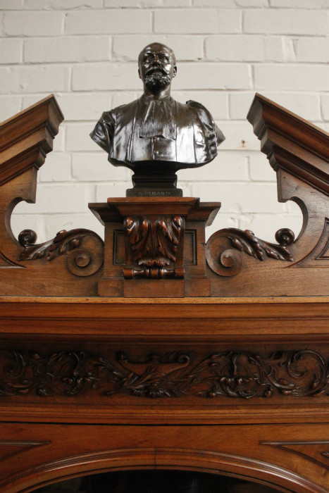 Exceptional monumental walnut renaissance bookcase with bronze statue of Doctor Pinard