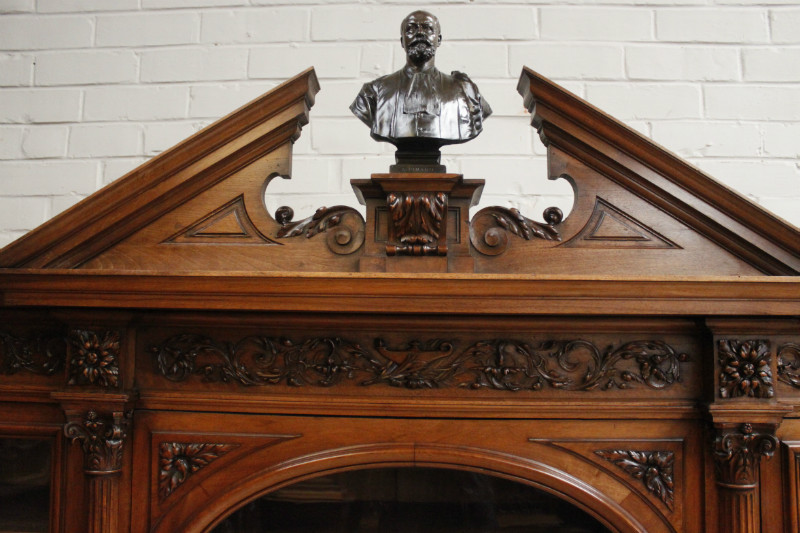 Exceptional monumental walnut renaissance bookcase with bronze statue of Doctor Pinard