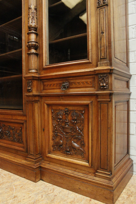 Exceptional monumental walnut renaissance bookcase with bronze statue of Doctor Pinard