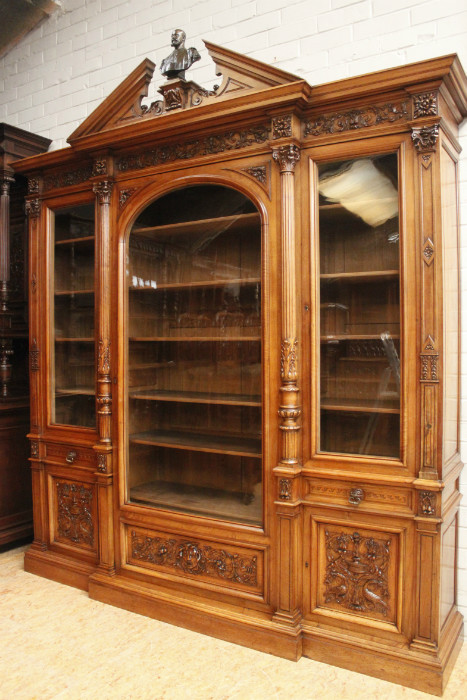 Exceptional monumental walnut renaissance bookcase with bronze statue of Doctor Pinard