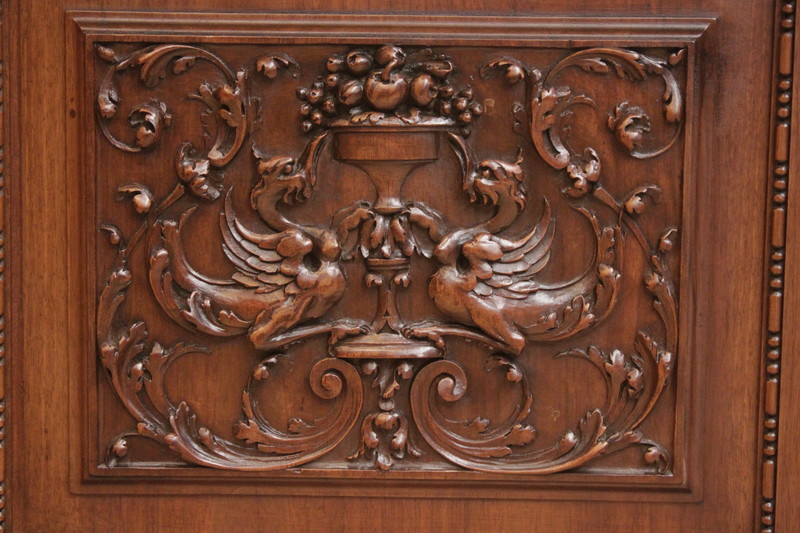 Exceptional renaissance showcase in walnut with iron doors