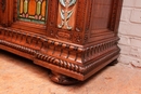 Renaissance style Display cabinet in walnut and faience, France 19th century