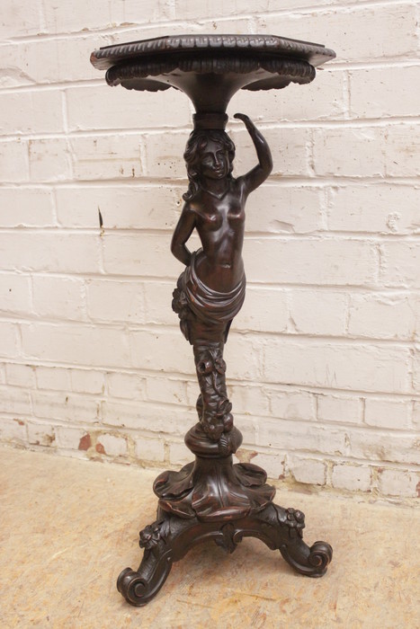 Figural pedestal in walnut