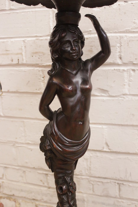 Figural pedestal in walnut