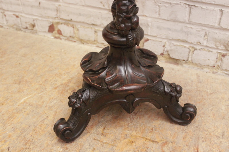 Figural pedestal in walnut