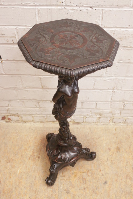 Figural pedestal in walnut