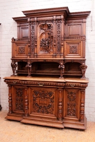 Figural Renaissance style cabinet in walnut dated 18 Dec 1889