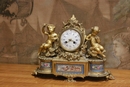 style Clock in gilt bronze, France 19th century